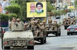  ?? ?? The loss of majority for Hezbollah and its allies will not affect the status of their weaponry control