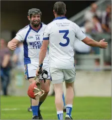  ??  ?? Andy O’Brien celebrates with John Connors,