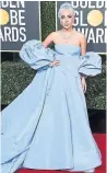  ??  ?? Lady Gaga surpasses our wildest style dreams periwinkle Valentino and matching chignon.