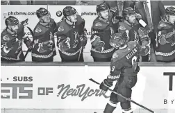  ?? MATT KARTOZIAN/USA TODAY SPORTS ?? Coyotes center Clayton Keller (9) celebrates with teammates after scoring a goal against the Blackhawks Wednesday night.