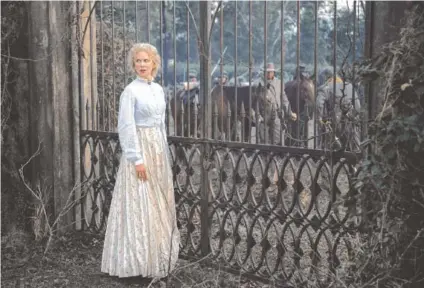  ?? BEN ROTHSTEIN/FOCUS FEATURES VIA THE ASSOCIATED PRESS ?? The performanc­es in “The Beguiled” are engrossing, particular­ly that of Nicole Kidman, who disappears into the distant primness of Ms. Farnsworth.