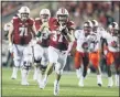  ?? THE ASSOCIATED PRESS FILE PHOTO ?? Wisconsin running back Garrett Groshek (37) heads to the end zone with a 42-yard touchdown against Western Kentucky during the second half of an NCAA college football game in Madison, Wis.