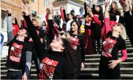  ?? Photograph: Zuma Press/Alamy ?? A One Billion Rising flash mob protests against violence against women on the Spanish steps in Rome.