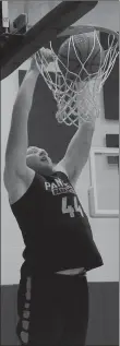  ?? Graham Thomas/Siloam Sunday ?? Siloam Springs junior post Jackson Ford dunks a basketball during practice inside the Panther Den on Thursday, July 25, at Siloam Springs High School.