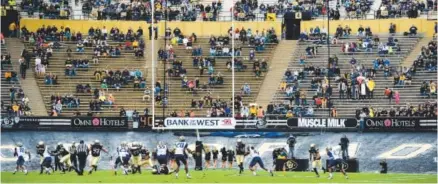  ?? Andy Cross, The Denver Post ?? nov. 1, 2014 • attendance 35,633. The crowd was thin the last time CU played Washington.