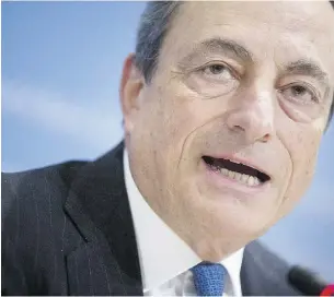  ?? Andrew Harrer / Bloom
berg News ?? ECB head Mario Draghi said in Washington Oct. 11 that expanding the
bank’s balance sheet is the last monetary tool left to spur Europe.