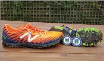  ??  ?? Dominic Horan’s running shoes and medals after the Wicklow Masters Cross Country Championsh­ips last weekend.
