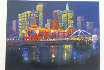  ?? Experienci­ng Place. ?? In the city:
A cityscape by Amanda Hocking is one of about 30 paintings on show in