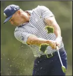  ?? Associated Press ?? Bryson DeChambeau hits his tee shot on the fourth hole during the first round at the Masters golf tournament at Augusta National Golf Club on Thursday in Augusta, Ga.