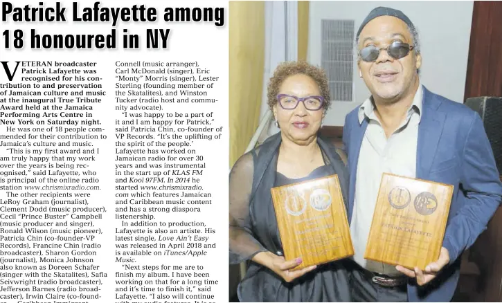  ??  ?? Broadcaste­rs Francine Chin and Patrick Lafayette pose with their plaques at the inaugural True Tribute Award held at the Jamaica Performing Arts Centre in New York on Saturday night.