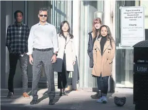  ?? STEVE RUSSELL TORONTO STAR ?? Dr. Muhammad Mamdani, second from left, and his team of data scientists at St. Michael’s Hospital — Joanna Pineda, from right, Michaelia Banning, Zhen Yang and Manish Batra — are the brains behind a new tool to keep track of homeless patients’ medical informatio­n.