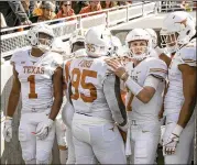  ?? JAY JANNER / AMERICAN-STATESMAN ?? QB Shane Buechele (second from right) played well at Baylor and deserves to stay in the lineup as long as Sam Ehlinger is banged up.