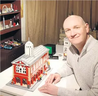  ??  ?? Chris Fearn with his 2,100-brick Tamworth Town Hall LEGO creation