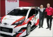  ?? (Photo MAXPPP) ?? Présentée par Akio Toyoda, PDG de Toyota Motor Corporatio­n, et Tommi Mäkinen, Team Principal, la Yaris attend ses pilotes.