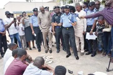  ?? Photo: NAN ?? Suspected fraudsters being paraded by the Commission­er of Police in Oyo State, Mr Shina Olukolu at the State Police Command in Eleyele, Ibadan yesterday.