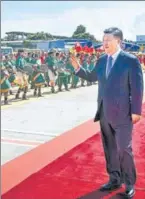  ?? PTI; AFP ?? ■ Clockwise from top: Prime Minister Narendra Modi and Chinese President Xi Jinping at the Shore Temple in Mamallapur­am; the two leaders at Krishna’s butterball in Mamallapur­am; President Xi Jinping arrives in Chennai on Friday.