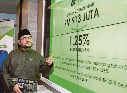  ?? BERNAMA PIC ?? Minister in the Prime Minister’s Department Datuk Seri Dr Mujahid Yusof at the announceme­nt of the Tabung Haji hibah in Putrajaya yesterday.