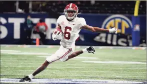  ?? Brynn Anderson / Associated Press ?? Alabama wide receiver DeVonta Smith runs against Florida during the first half of the SEC Championsh­ip in Atlanta on Dec. 19.