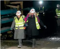  ?? PHOTO: SUPPLIED ?? Anna Osborne and Sonya Rockhouse emerge from the Pike River Mine after walking for the first time up to the 30-metre seal.