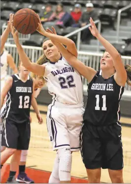  ?? Jeremy Stewart / Rome News-Tribune ?? Darlington’s Victoria Pierce (left) tries to get a shot off while being guarded by Gordon Lee’s Lexie Clark during the first round of the Region 7-AA tournament Monday at Chattooga.