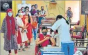  ?? ANI ?? A health worker administer­s the Covid-19 vaccine to a woman in Bengaluru on Monday.