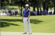  ?? TONY GUTIERREZ — THE ASSOCIATED PRESS ?? Jordan Spieth reacts to a putt as he competes in the final round of the Dean & DeLuca Invitation­al golf tournament at Colonial, Sunday in Fort Worth, Texas.