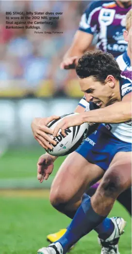  ??  ?? BIG STAGE: Billy Slater dives over to score in the 2012 NRL grand final against the Canterbury Bankstown Bulldogs.Picture: Gregg Porteous