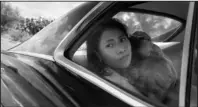  ?? The Associated Press ?? ROMA FILM: This image released by Netflix shows Yalitza Aparicio in a scene from the film “Roma,” by filmmaker Alfonso Cuaron. Aparicio portrays Cleo, a domestic worker who works for a woman whose husband abandons her and their four children.