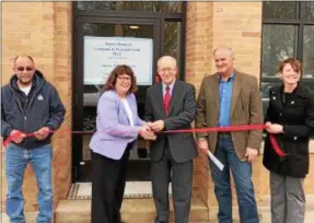  ?? SUBMITTED PHOTO ?? From left, Michael Capparelli, director, Oneida Savings Bank Charitable Foundation; Tina Wayland-Smith of Campanie & Wayland-Smith PLLC; S. John Campanie of Campanie & Wayland-Smith PLLC; Eric Stickels, president, Oneida Savings Bank Charitable...