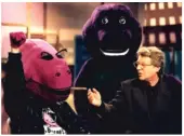  ?? SUN- TIMES FILE ?? Jerry Springer meets “dads who hate Barney” on a 1993 episode of his talk show.