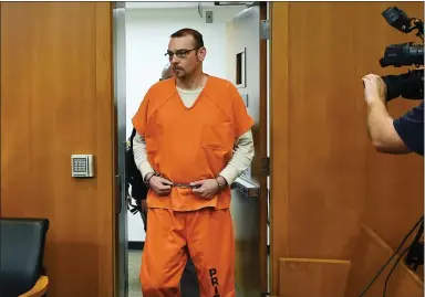  ?? CLARENCE TABB JR. — DETROIT NEWS VIA AP, POOL ?? James Crumbley enters the courtroom during his motion hearing at Oakland County Courthouse on Feb. 21in Pontiac.