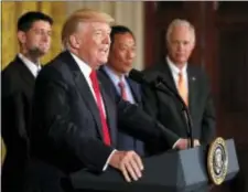  ?? CAROLYN KASTER - THE ASSOCIATED PRESS ?? President Donald Trump speaks in the East Room accompanie­d by House Speaker Paul Ryan of Wis., Foxconn CEO and founder Terry Gou, and Sen. Ron Johnson, R-Wis., at the White House in Washington, Wednesday. Trump said that electronic­s giant Foxconn will...