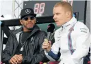  ?? /Reuters ?? Hot seat: New Mercedes driver Valtteri Bottas from Finland, right, will team up with Lewis Hamilton in 2017.