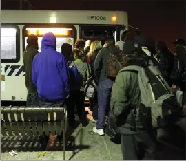  ?? NHAT V. MEYER — BANG ARCHIVES ?? In this 2013file photo, riders board the 1:16a.m. #22VTA bus from the Eastridge Transit Center on the way to the Palo Alto Transit Center in San Jose.