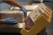  ?? JEFF CHIU ?? Envelopes containing ballots are shown at a San Francisco Department of Elections at a voting center in San Francisco, Sunday, Nov. 1, 2020.