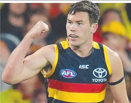  ?? FIRED UP: Mitch McGovern celebrates during the AFL qualifying final match between the Crows and GWS Giants at Adelaide Oval. ??