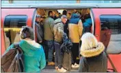  ?? Daniel Leal-Olivas AFP/Getty Images ?? BRITAIN’S stringent measures came after commuters and others ignored social distancing guidelines.