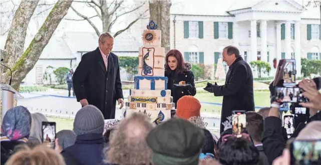  ?? BRANDON DAHLBERG / FOR COMMERCIAL­APPEAL.COM ?? Kevin Kane (left), Priscilla Presley (center), and Jack Soden (right), cut the birthday cake during the Elvis Birthday Proclamati­on Ceremony on Jan. 8, 2022, in Memphis.