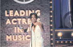  ?? ?? Adrienne Warren accepts her Tony Award.