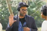  ?? Justin Lubin / Universal Pictures ?? Christophe­r Plummer became the oldest Academy Award nominee. Jordan Peele makes his film directing debut with “Get Out.”