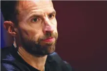  ?? THE ASSOCIATED PRESS ?? England coach Gareth Southgate listens to a question during a news conference Tuesday on the eve of the semifinal match between England and Croatia at the World Cup in Moscow, Russia.