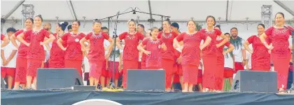  ?? ?? Kaitaia’s local Samoan community aiga (family) Samoan Siva were the opening act for the festival.