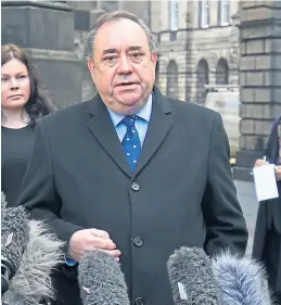  ??  ?? COURT FIGHT: Alex Salmond talking to the media after his legal victory
