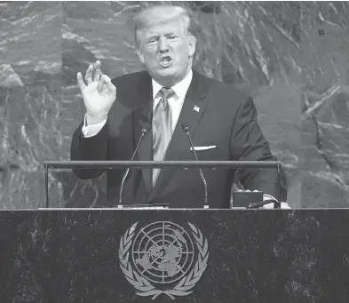  ?? DREW ANGERER / GETTY IMAGES ?? President Donald Trump addresses the United Nations General Assembly in New York Tuesday, where he referred to North Korean leader Kim Jong Un as “Rocket Man” and accused Iran of financing terror.