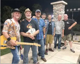  ?? PILOT NEWS GROUP FILE PHOTO ?? Cornfield Mafia returns to Plymouth for Mayor’s Month of Music this year on Friday, July 7 in River Park Square. Shown in photo: City of Plymouth Mayor Mark Senter shown with Cornfield Mafia in 2021.