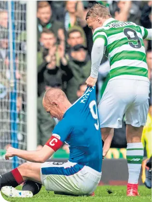  ??  ?? Kenny Miller and Leigh Griffiths clash during last April’s Old Firm game