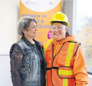  ?? NAOMI HILTZ STAR METRO MEDIA ?? Dolores Montavez-Ruz, left, manager of employment and training for the YWCA, with Jenny Trujillo, who completed the commercial-residentia­l painter decorator pre-apprentice­ship program.