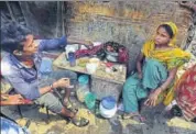  ?? SONU MEHTA/HT PHOTO ?? Ragina, 25, (right) was a ragpicker at the Ghazipur landfill. Several items in her house were picked up from the garbage dump. She used to sell recyclable waste to local traders for a living. She lives in a shanty near the dump yard.