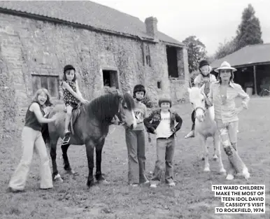  ?? ?? THE WARD CHILDREN MAKE THE MOST OF TEEN IDOL DAVID CASSIDY’S VISIT TO ROCKFIELD, 1974