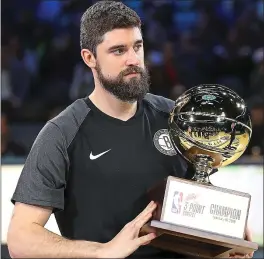  ?? STREETER LECKA — GETTY IMAGES ?? Brooklyn’s Joe Harris celebrates his win over Stephen Curry in the 3-point contest.